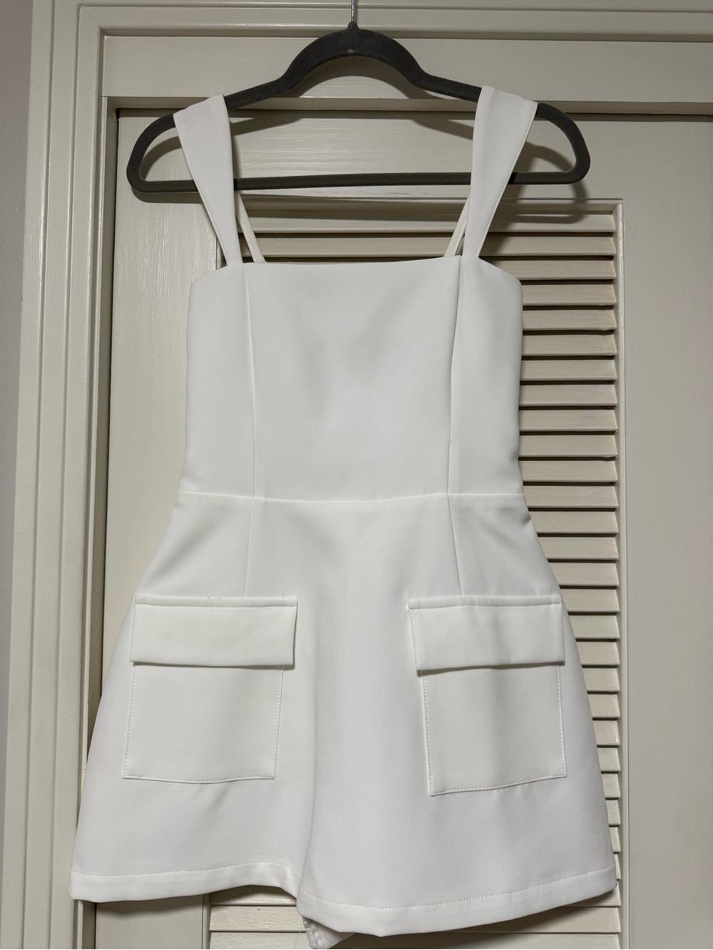 White Pinafore-Style Bodysuit Dress with Front Flap Pockets